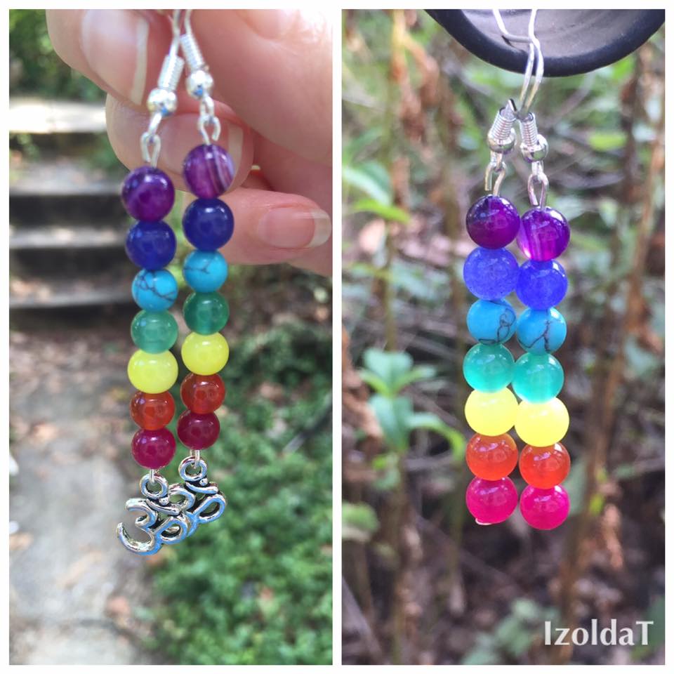 two sets of earrings in chakra rainbow colors